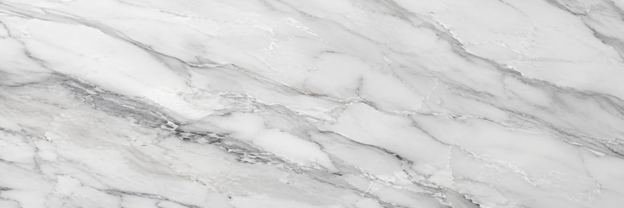 Art direction reference. Cool marble and restrained contrast set the national visual register.