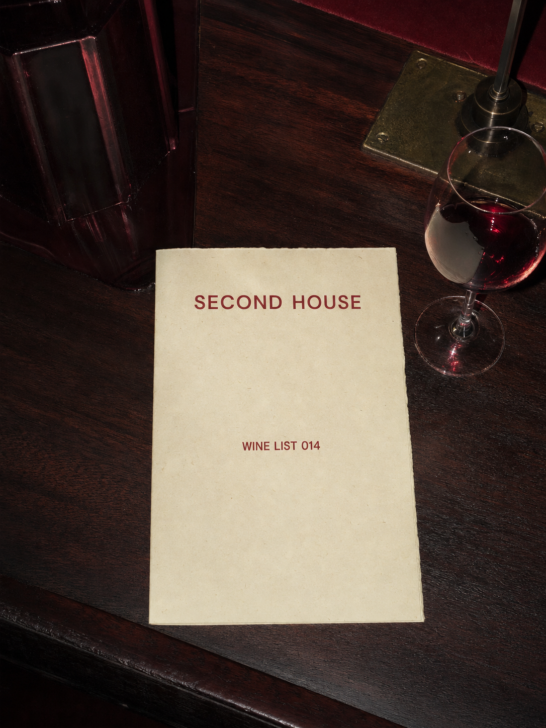 Daily menu, typeset and dated. The document is the brand's most frequent touchpoint, so it is never generic.